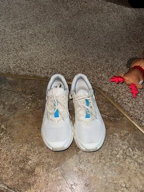 On Running White Sneakers with Blue Accents
